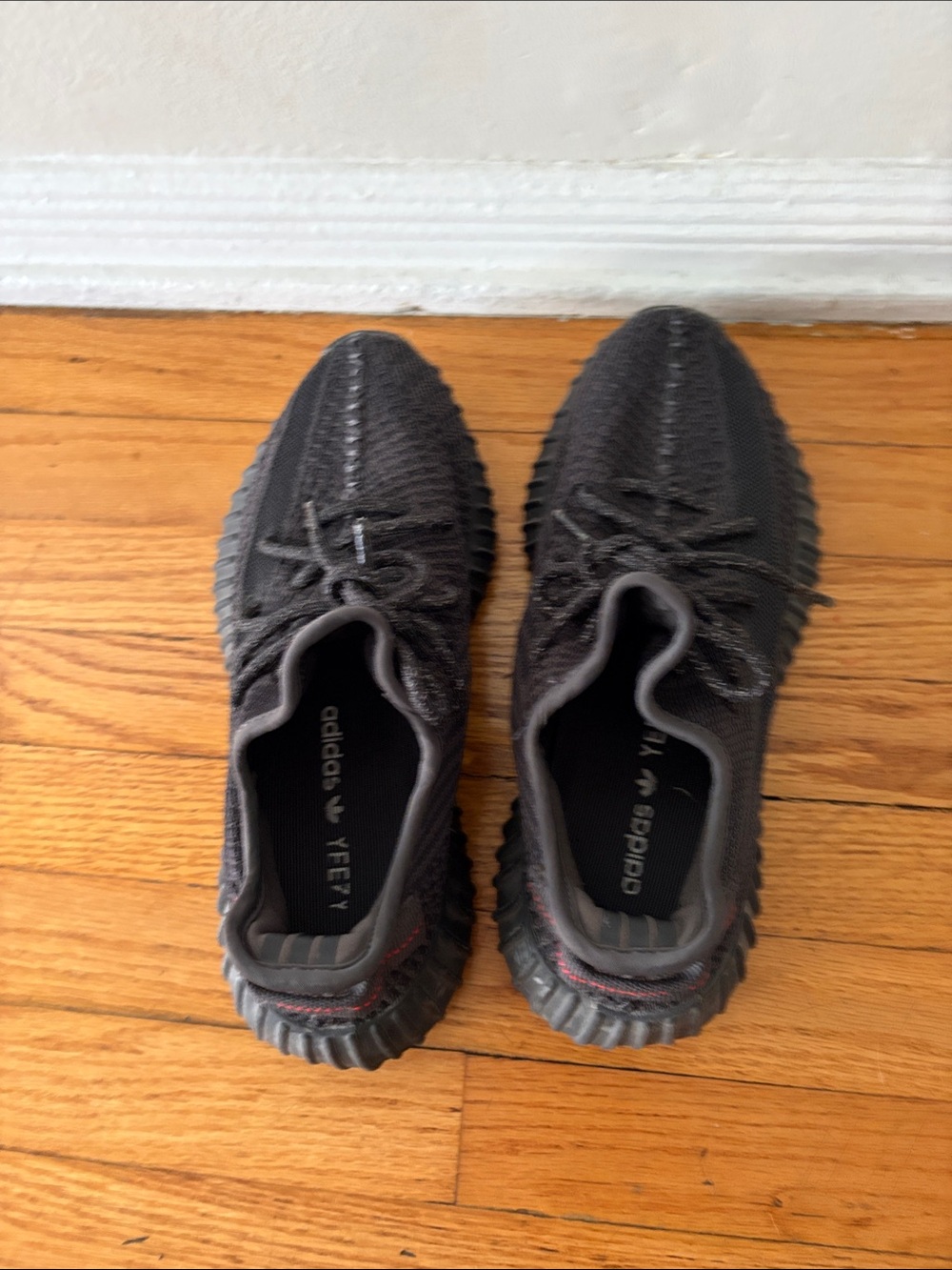 adidas Yeezy Boost 350 V2 in Black with Red Heel Stitch